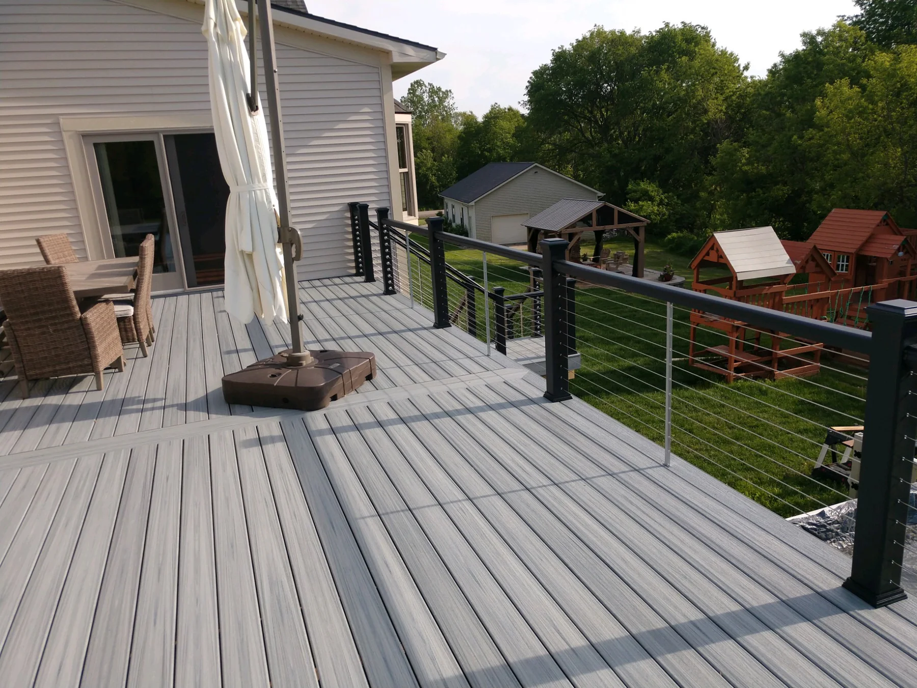 Mid-Michigan Construction - Custom TrexPro Deck Installation