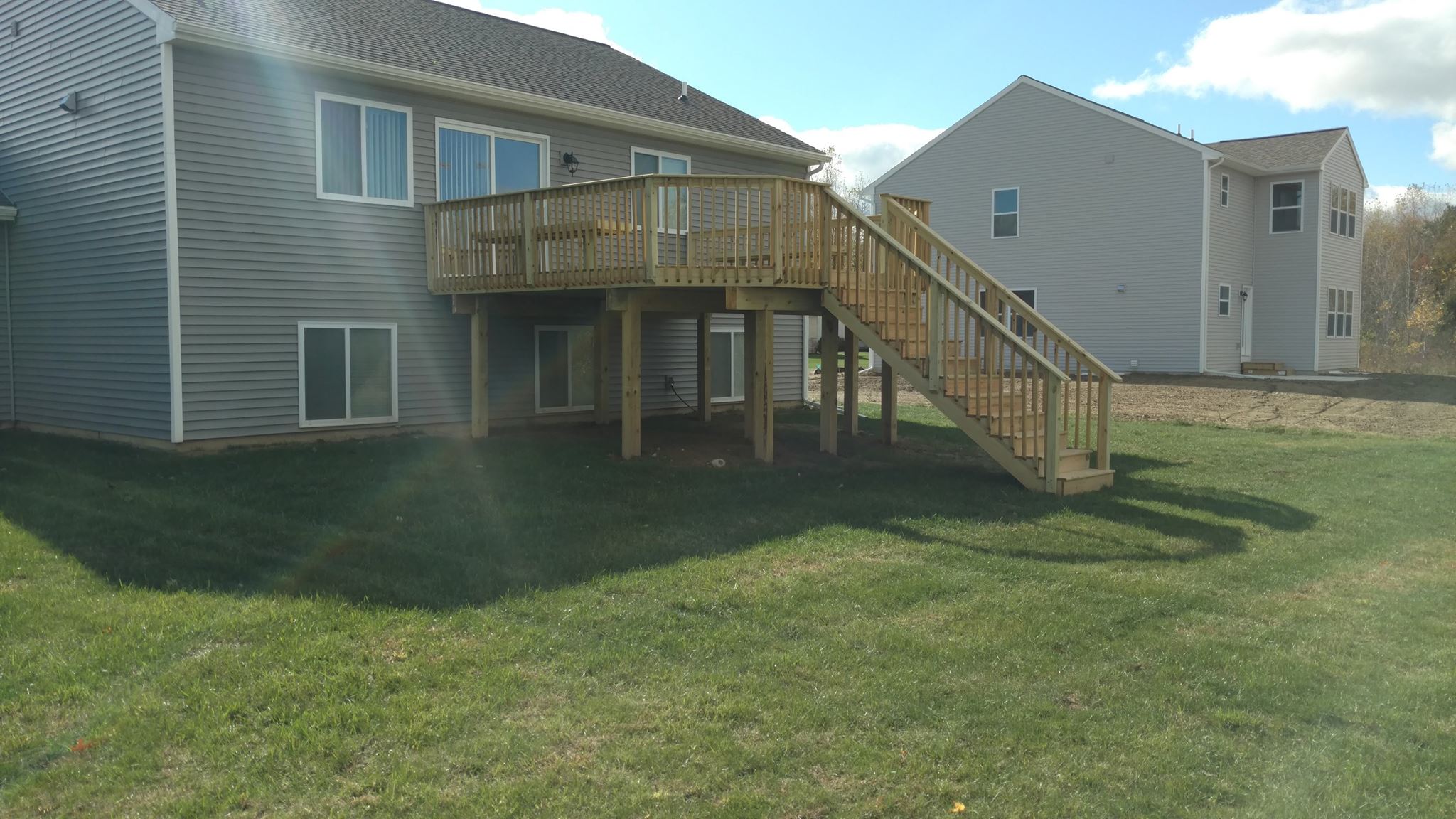 Mid-Michigan Construction - Trex deck project completed by Bossman Construction